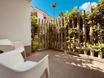 Jardín al aire libre en Apartamentos las Rocas 9
