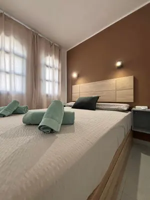 Cama o camas de una habitación en Canarian Agua Marina By lucaproperties