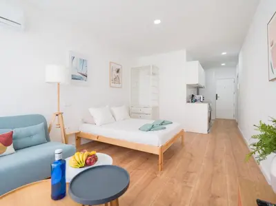 Cama o camas de una habitación en Downtown Studio Canteras