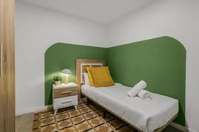Cama o camas de una habitación en Living Central Stay Bejeque