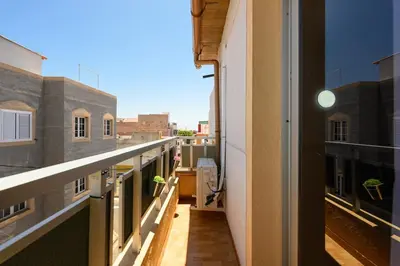 Un balcón o terraza de Coquete Apartment,Near Airport,Balcony,Cozy