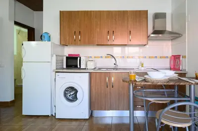 Una cocina o zona de cocina en Coquete Apartment,Near Airport,Balcony,Cozy