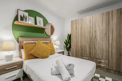 Cama o camas de una habitación en Living Central Stay Verol