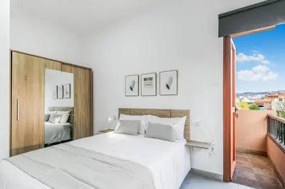 Cama o camas de una habitación en Galdar Modern Suites