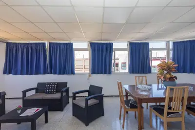 Zona de estar de Apartamentos L O L A Arguineguin