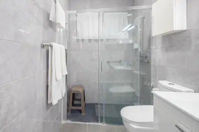 Un baño de Apartamentos L O L A Arguineguin