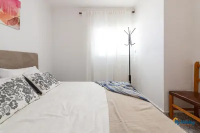 Cama o camas de una habitación en Olas' Sunset