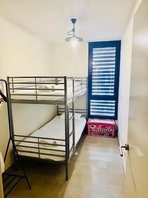 Cama o camas de una habitación en Casa de la playa