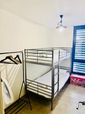 Cama o camas de una habitación en Casa de la playa