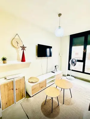 Una televisión o centro de entretenimiento en Casa de la playa