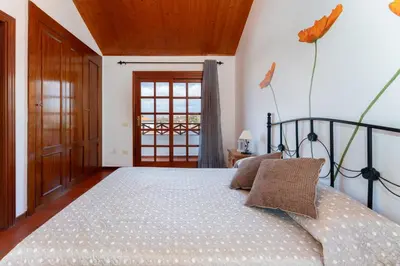 Cama o camas de una habitación en Vivelorural Los Tableros Agaete great terrace