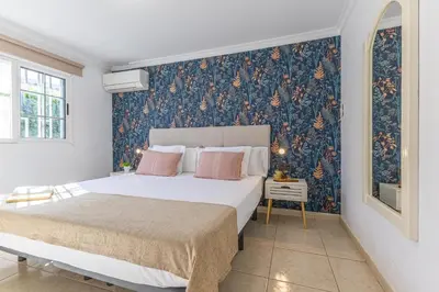 Cama o camas de una habitación en Careva Suites 21 by VillaGranCanaria