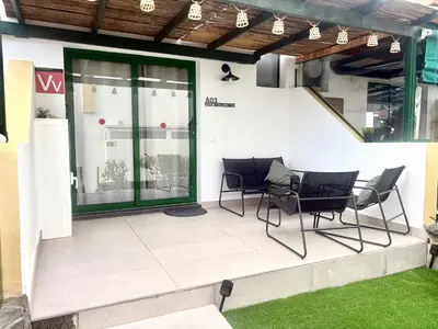 Un patio o zona al aire libre en Vega Maspalomas - Escapada de sol, piscina y relax