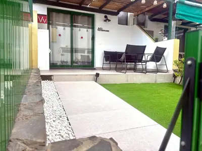 Un patio o zona al aire libre en Vega Maspalomas - Escapada de sol, piscina y relax
