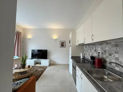 Una cocina o zona de cocina en Sea City Apartment