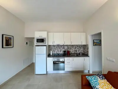 Una cocina o zona de cocina en Sea City Apartment