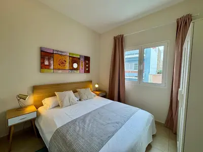 Cama o camas de una habitación en Sea City Apartment