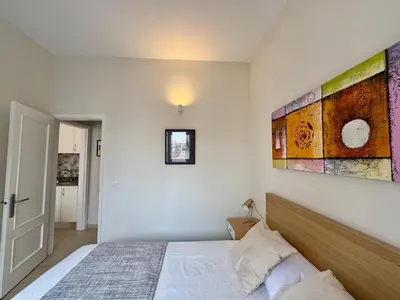 Cama o camas de una habitación en Sea City Apartment