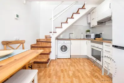 Una cocina o zona de cocina en Bungalow con terraza privada y piscina en Gran Canaria