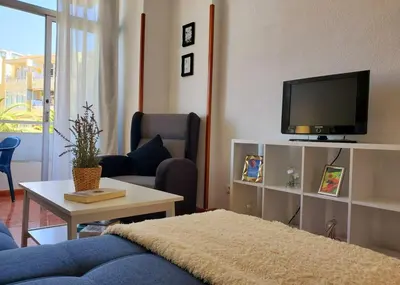 Una televisión o centro de entretenimiento en 2 Bedrooms Ap Yumbo Center