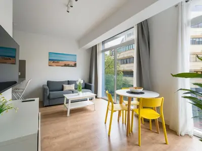 Zona de estar de Ferreras Suites Las Canteras