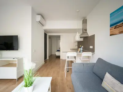 Zona de estar de Ferreras Suites Las Canteras