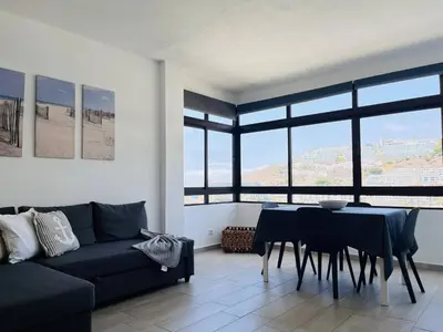 Zona de estar de Penthouse on the Ocean by Alquiler de Sueno
