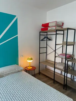 Cama o camas de una habitación en La ISLETA BONITA by Las Palmas PeOple