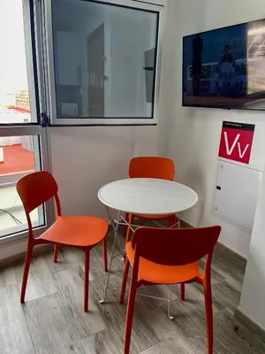 Una televisión o centro de entretenimiento en La ISLETA BONITA by Las Palmas PeOple