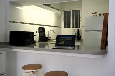Una cocina o zona de cocina en Apartamento con vistas al mar T