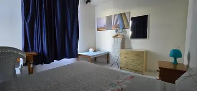 Cama o camas de una habitación en Apt Río Piedra Puerto Rico