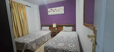 Cama o camas de una habitación en Apt Plaza 1 San Fernando