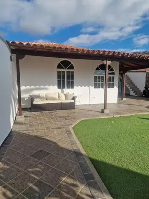 Zona de estar de Villa Palmera Dorada