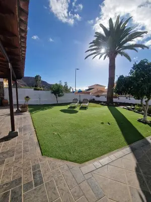 Jardín al aire libre en Villa Palmera Dorada