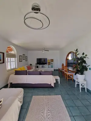 Cama o camas de una habitación en Villa Palmera Dorada