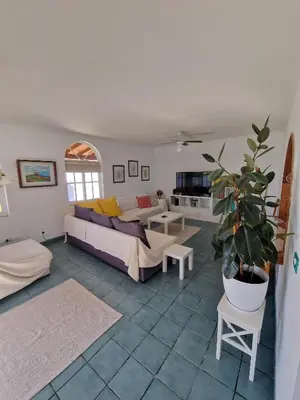 Zona de estar de Villa Palmera Dorada
