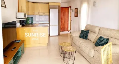 Una cocina o zona de cocina en The Sunrise Home Sea views and terrace house with barbecue