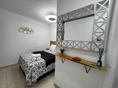 Cama o camas de una habitación en Piso completo a pocos metros de la playa