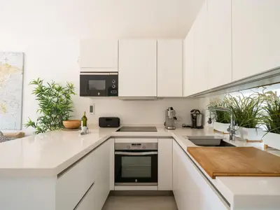 Una cocina o zona de cocina en Cozy house with private jacuzzi Maspalomas