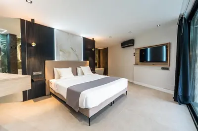 Cama o camas de una habitación en Villa Soleil Anfi Tauro Golf
