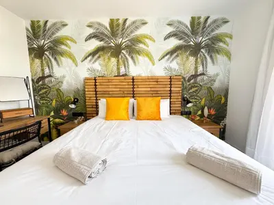 Cama o camas de una habitación en Oasis Beach Home Meloneras with jacuzzi