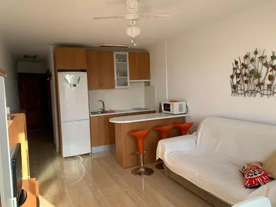 Una cocina o zona de cocina en Apartamentos 