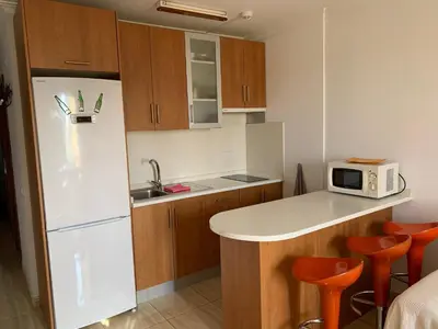 Una cocina o zona de cocina en Apartamentos 