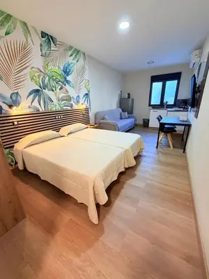 Cama o camas de una habitación en TABLERO 101, coqueto y moderno estudio