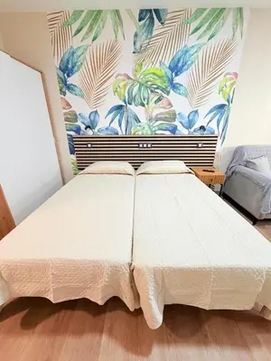 Cama o camas de una habitación en TABLERO 101, coqueto y moderno estudio
