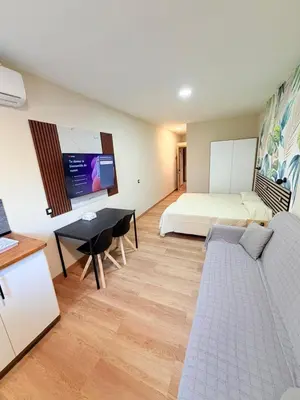 Cama o camas de una habitación en TABLERO 101, coqueto y moderno estudio
