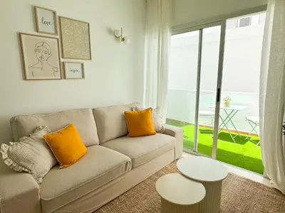 Zona de estar de Peaceful Beach House by CanaryScape