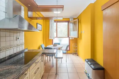 Una cocina o zona de cocina en GuestReady - Naranjo House en pleno centro Telde