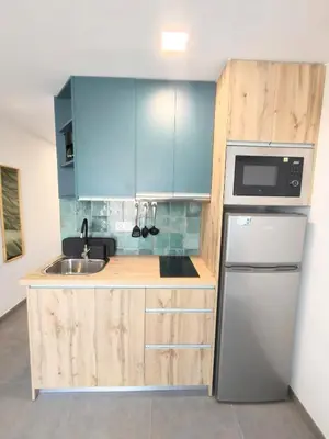 Una cocina o zona de cocina en Green Day by Casas Cocodrilo