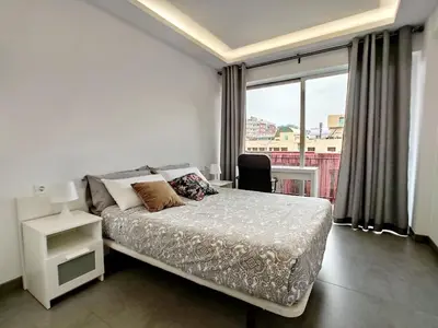 Cama o camas de una habitación en Income Spain Apartamentos